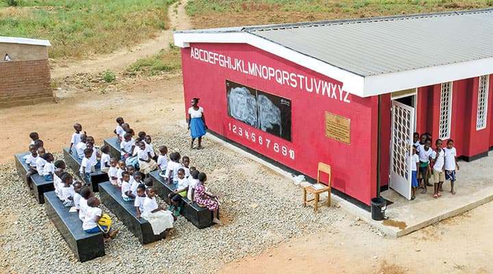 A 3-D printed school filled with students and teachers