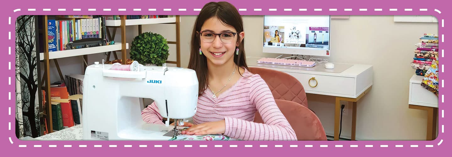 Giuliana Demma smiles with her sewing machine