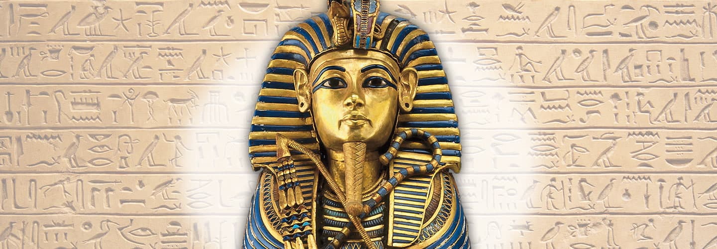 Ancient Eygptian gold pharaoh tomb against a backdrop of hieroglyphics